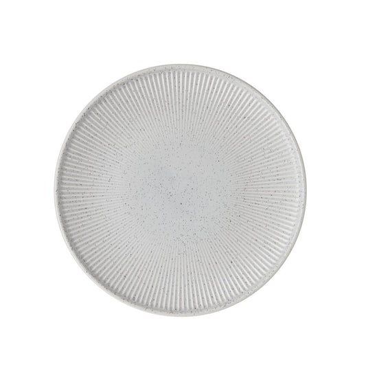 Round textured grey plate on a white background