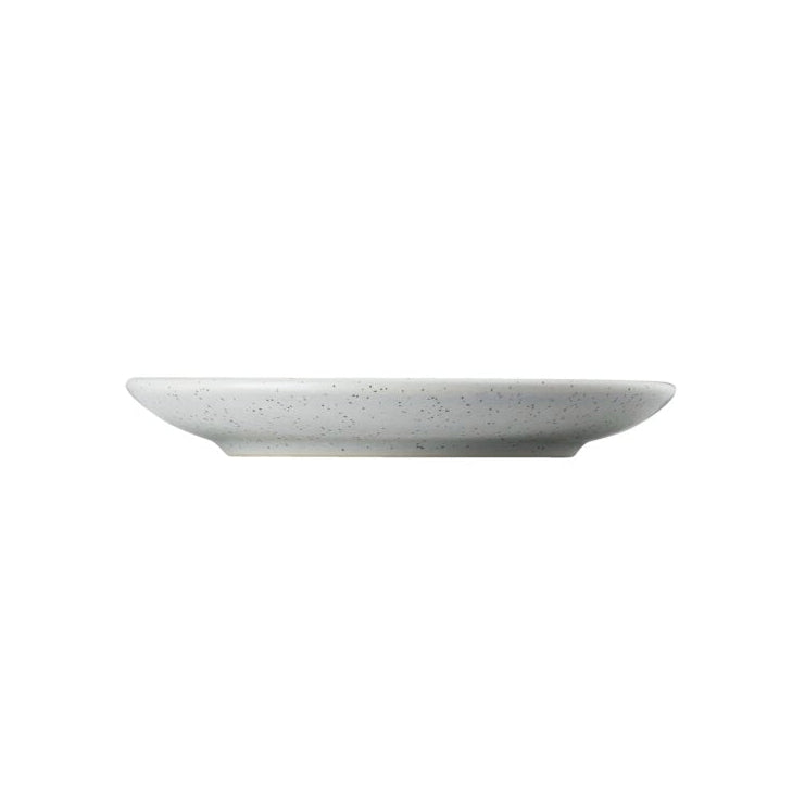 White ceramic plate on a white background