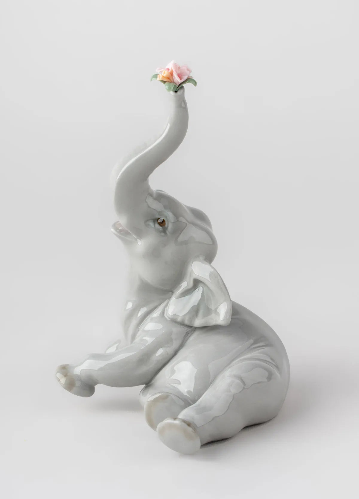 Lladro Baby Elephant with Pink Flower Figurine-Goviers